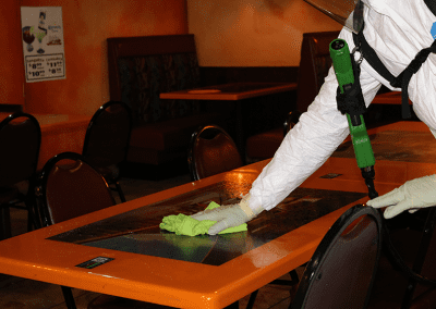 disinfecting restaurant table